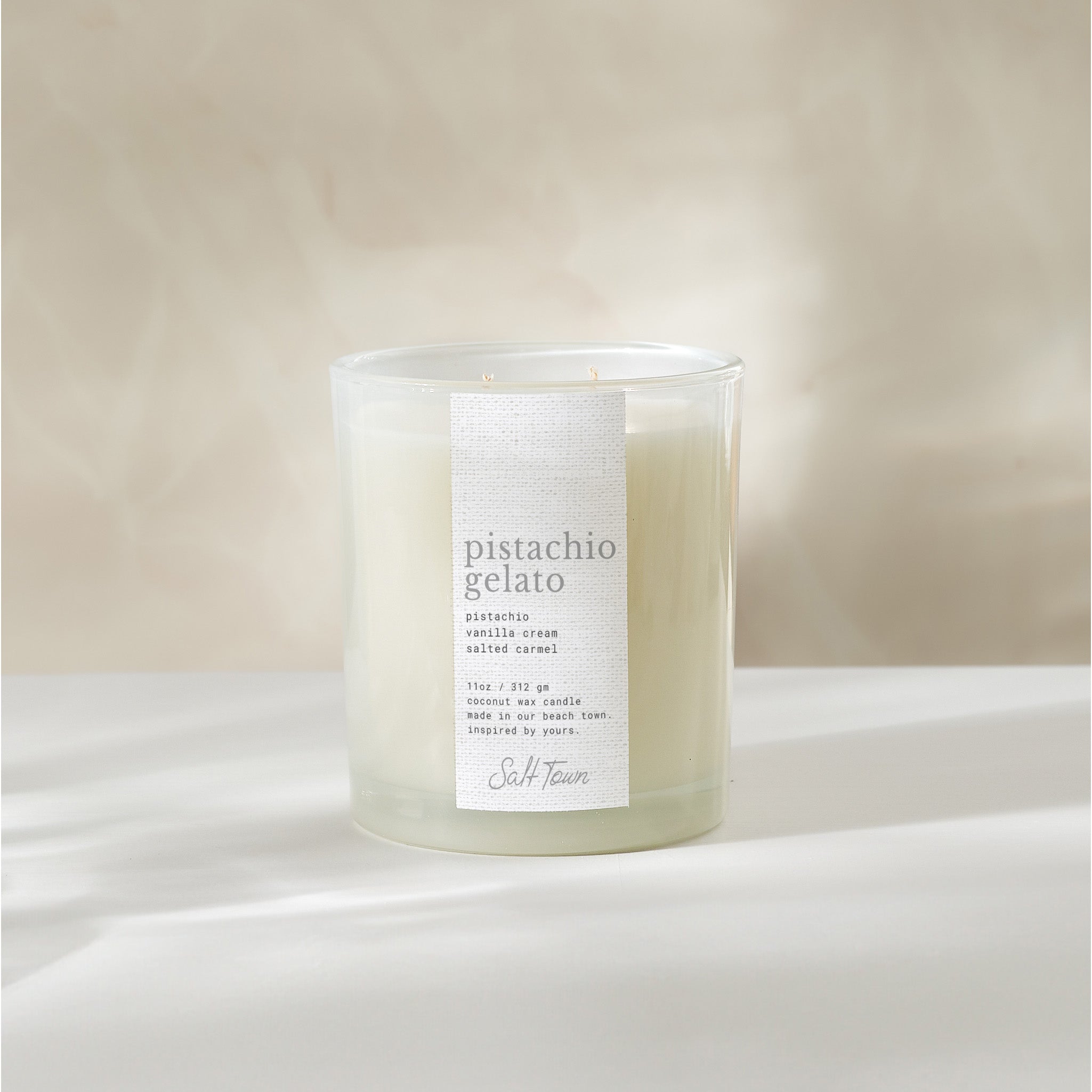 Candle labeled &
