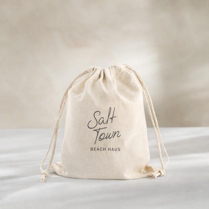 Beige drawstring bag with &