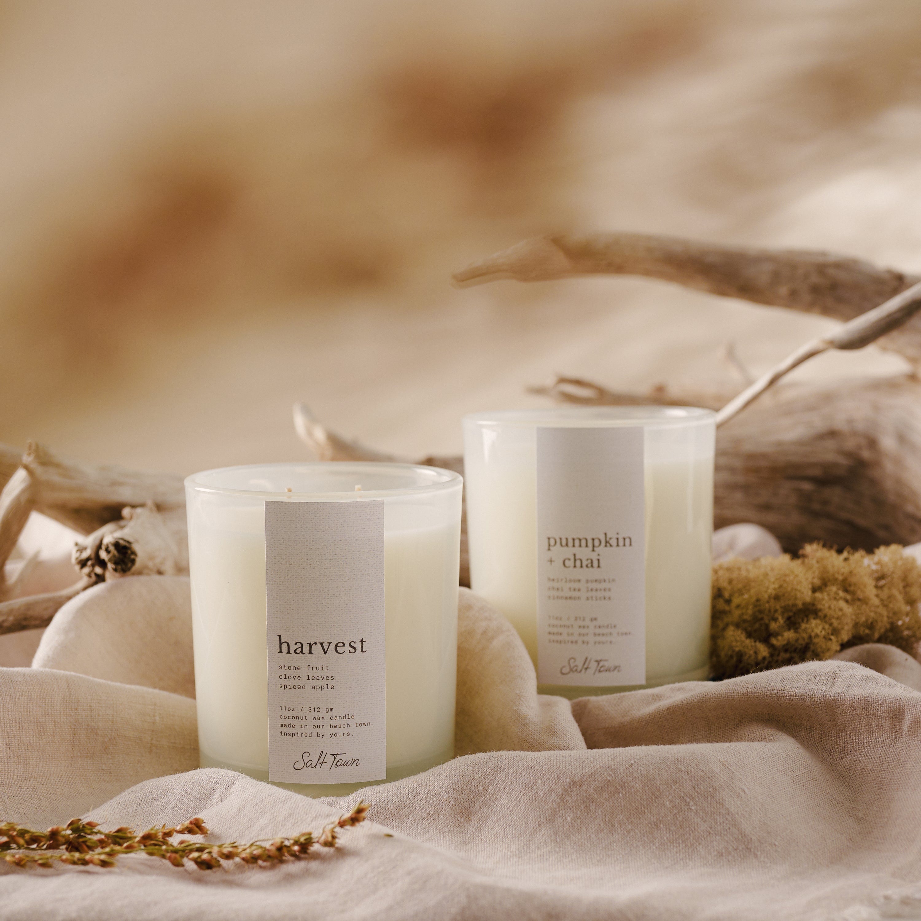 Two candles labeled &