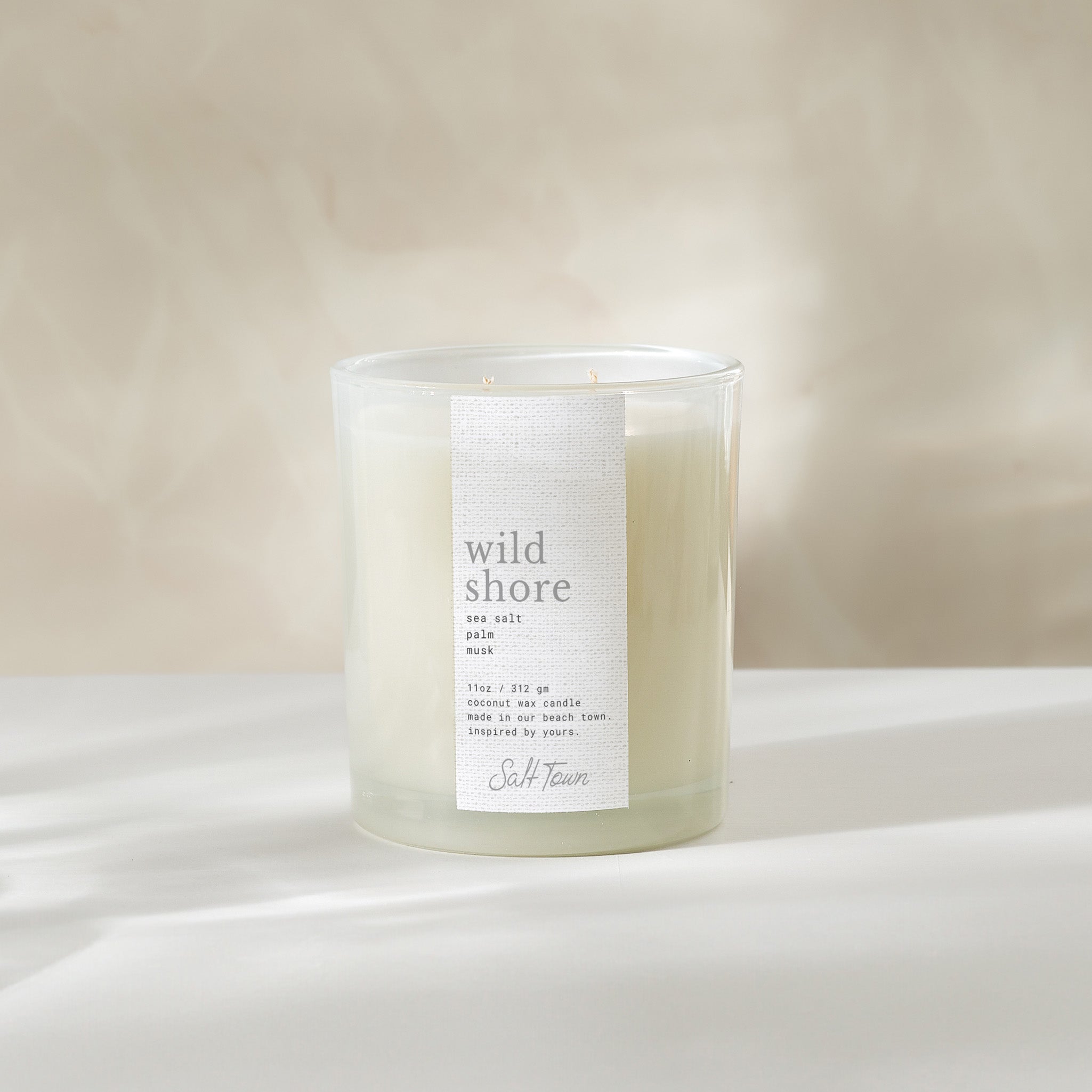 Candle labeled &